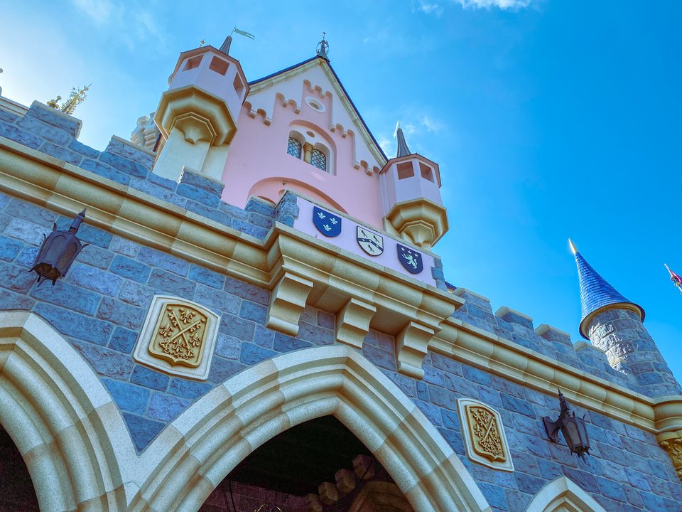 Clock tower and colorful facade of it’s a small world at Disneyland in Anaheim, California