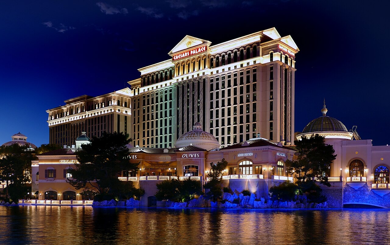 Caesars Palace lit at night from Las Vegas Boulevard