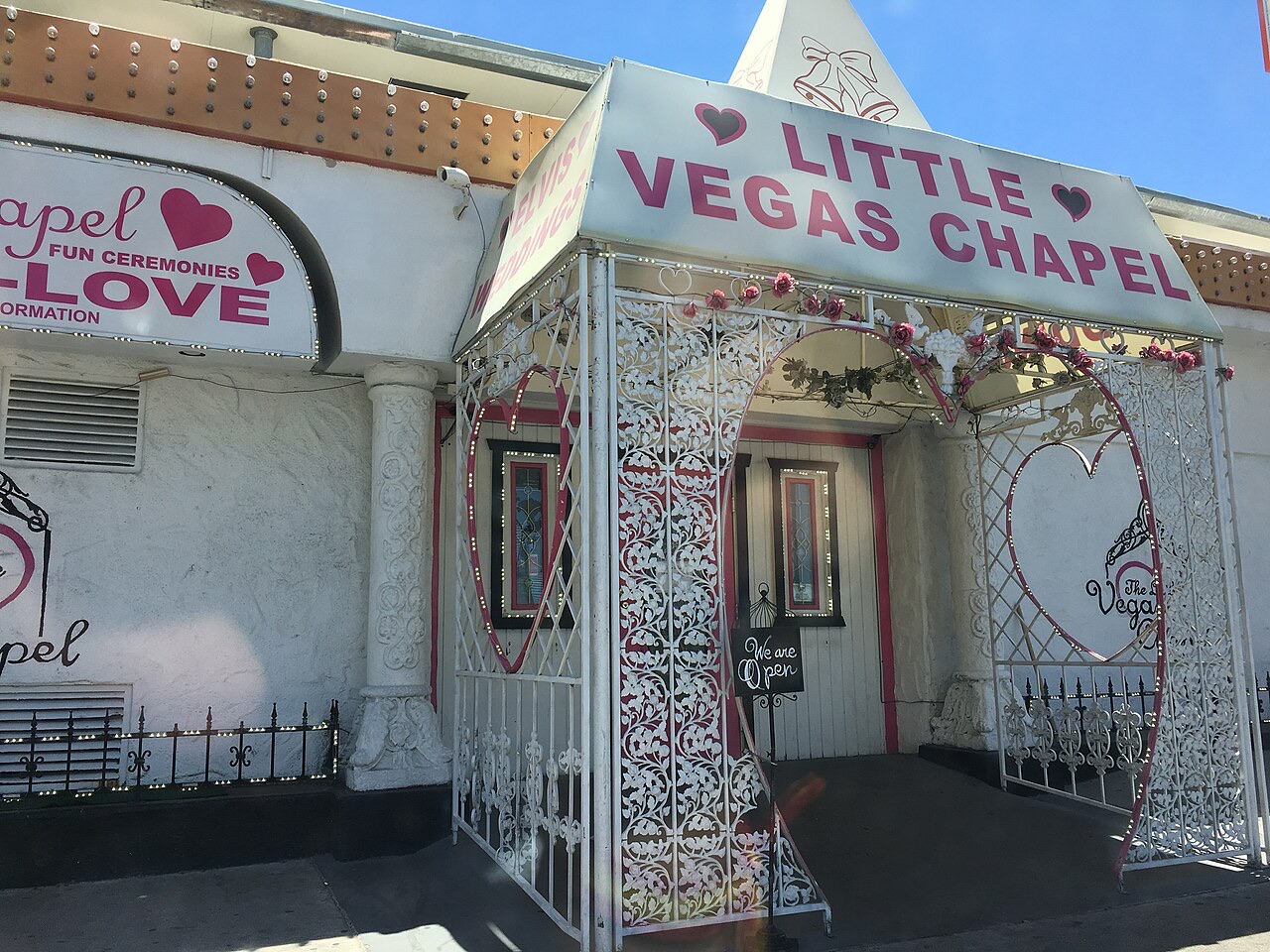 Entrance canopy of The Little Vegas Chapel with its heart-shaped arch and Elvis Weddings sign